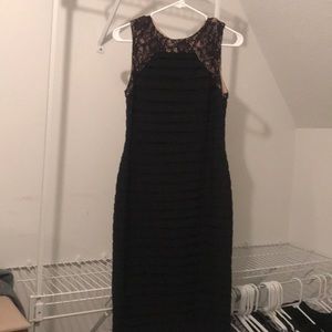 Black slim fitted knee length dress